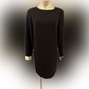 Theory Women's Black Dress with White Cuffs Size 6
Retail Price: $245.00